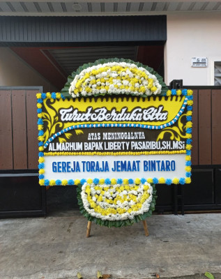 Papan Bunga Duka di Tambula